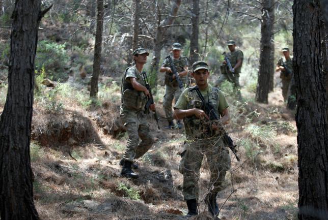 Turkish soldiers search for missing military personnel suspected of being involved in the coup attempt in Marmaris